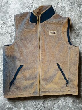 The North Face Beige Sherpa Vest with Navy Accents